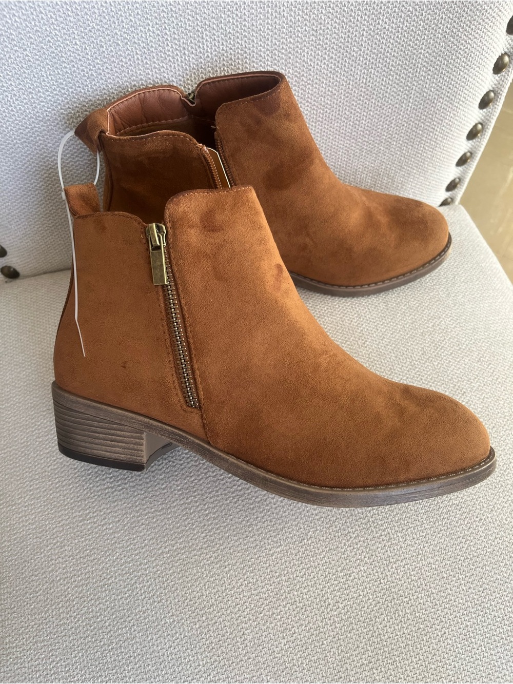 NWT Brown suede-like ankle booties featuring a round toe, a low block heel, and